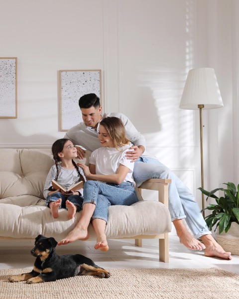 Family In Living Room With Dog